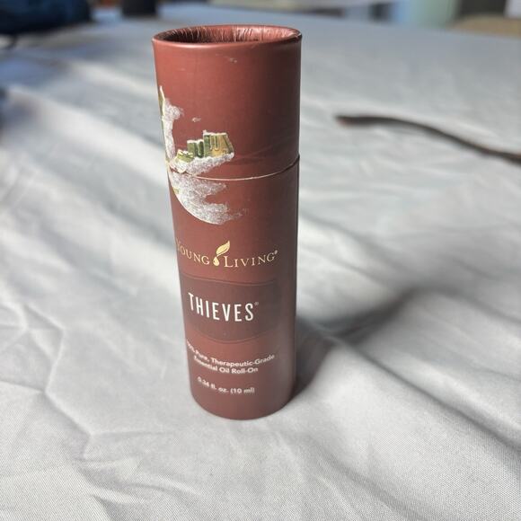 Young Living Essential Oils THIEVES 10ml Roll-On 95% Full - Picture 2 of 3